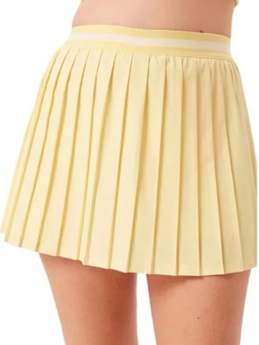 Girlfriend collective lemonade yellow pleated skort